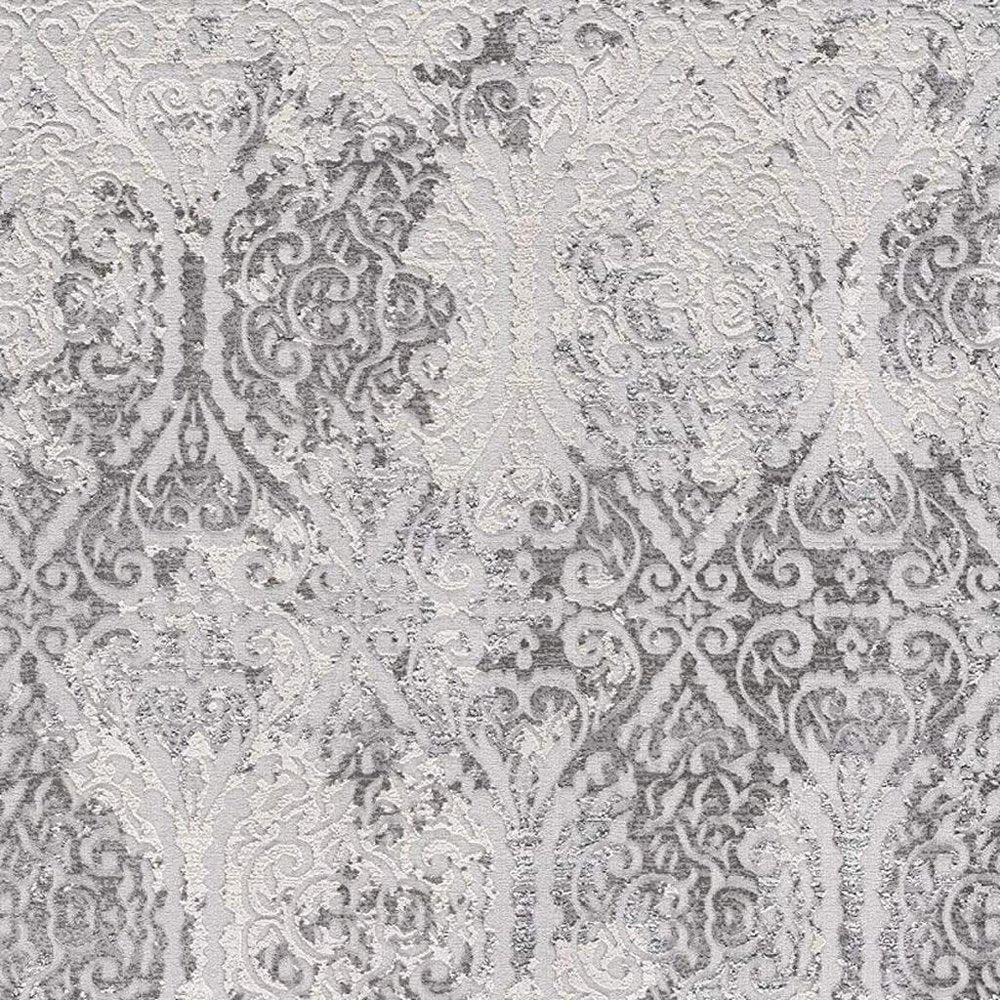 7' X 10' Cream And Gray Tinted Ogee Pattern Area Rug