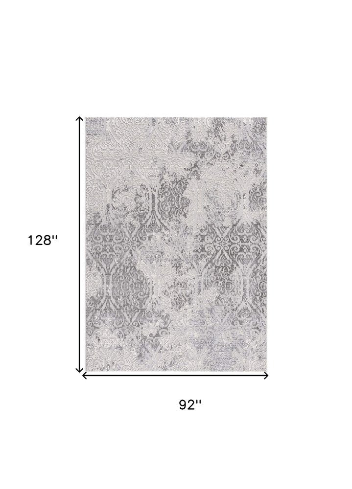 7' X 10' Cream And Gray Tinted Ogee Pattern Area Rug