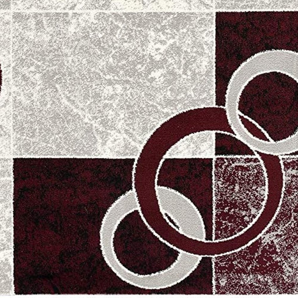 10' Red And White Abstract Runner Rug