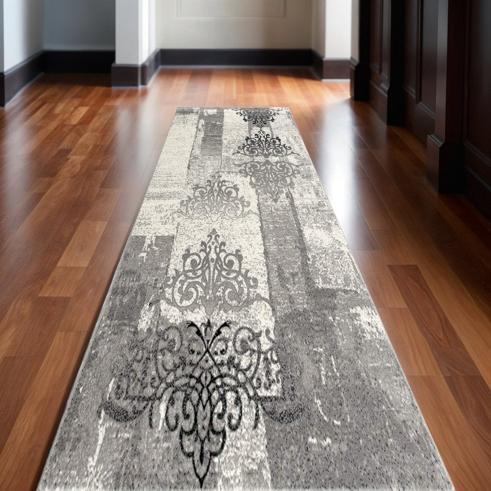 4' X 6' Gray And Ivory Damask Distressed Area Rug