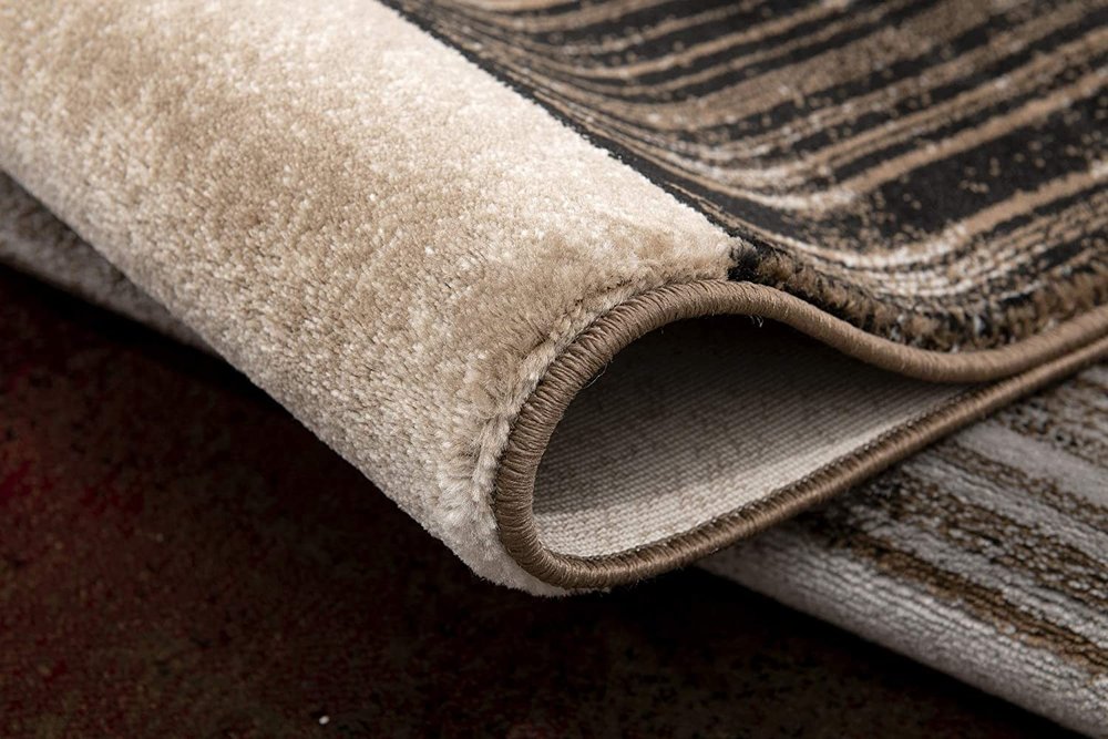 2' X 4' Beige And Brown Abstract Shag Area Rug