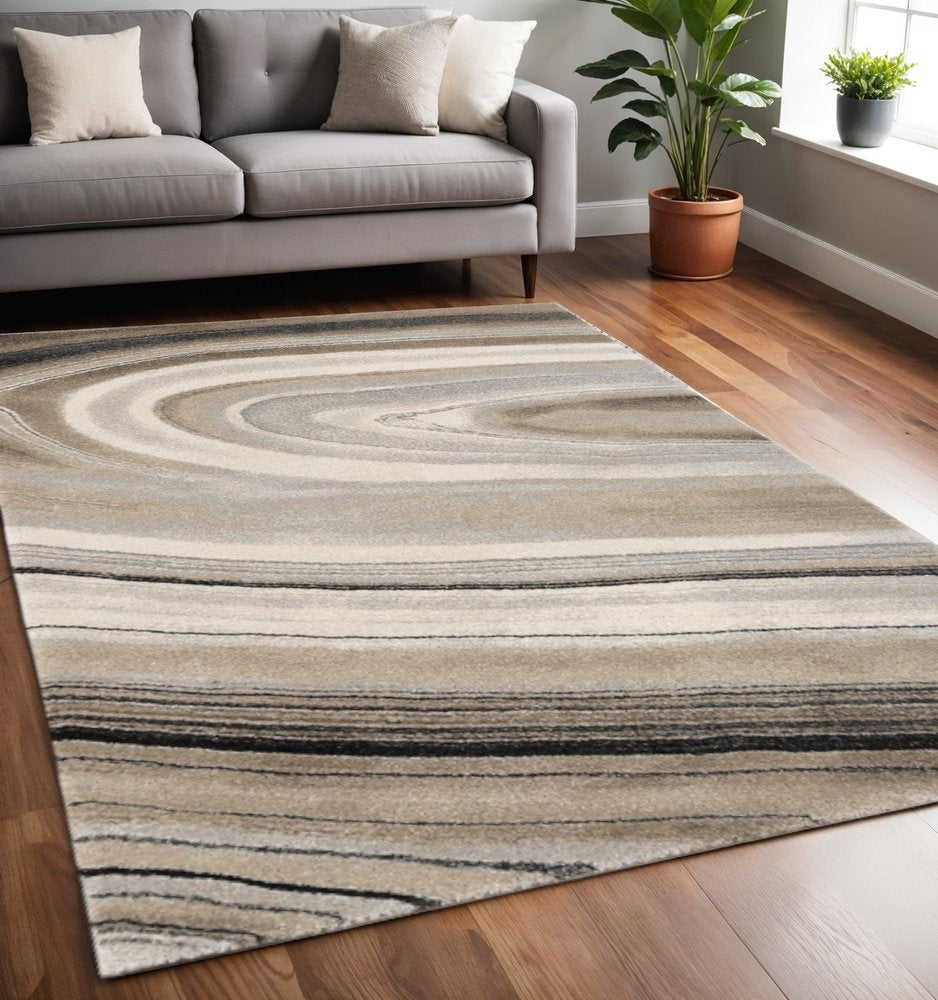 5' X 8' Cream and Tan Abstract Marble Area Rug