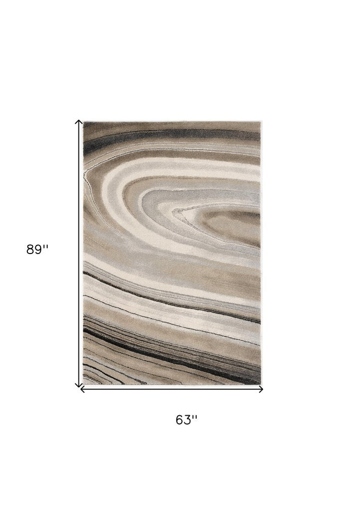 5' X 8' Cream and Tan Abstract Marble Area Rug
