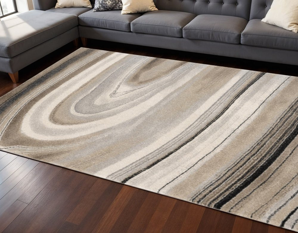 5' X 8' Cream and Tan Abstract Marble Area Rug