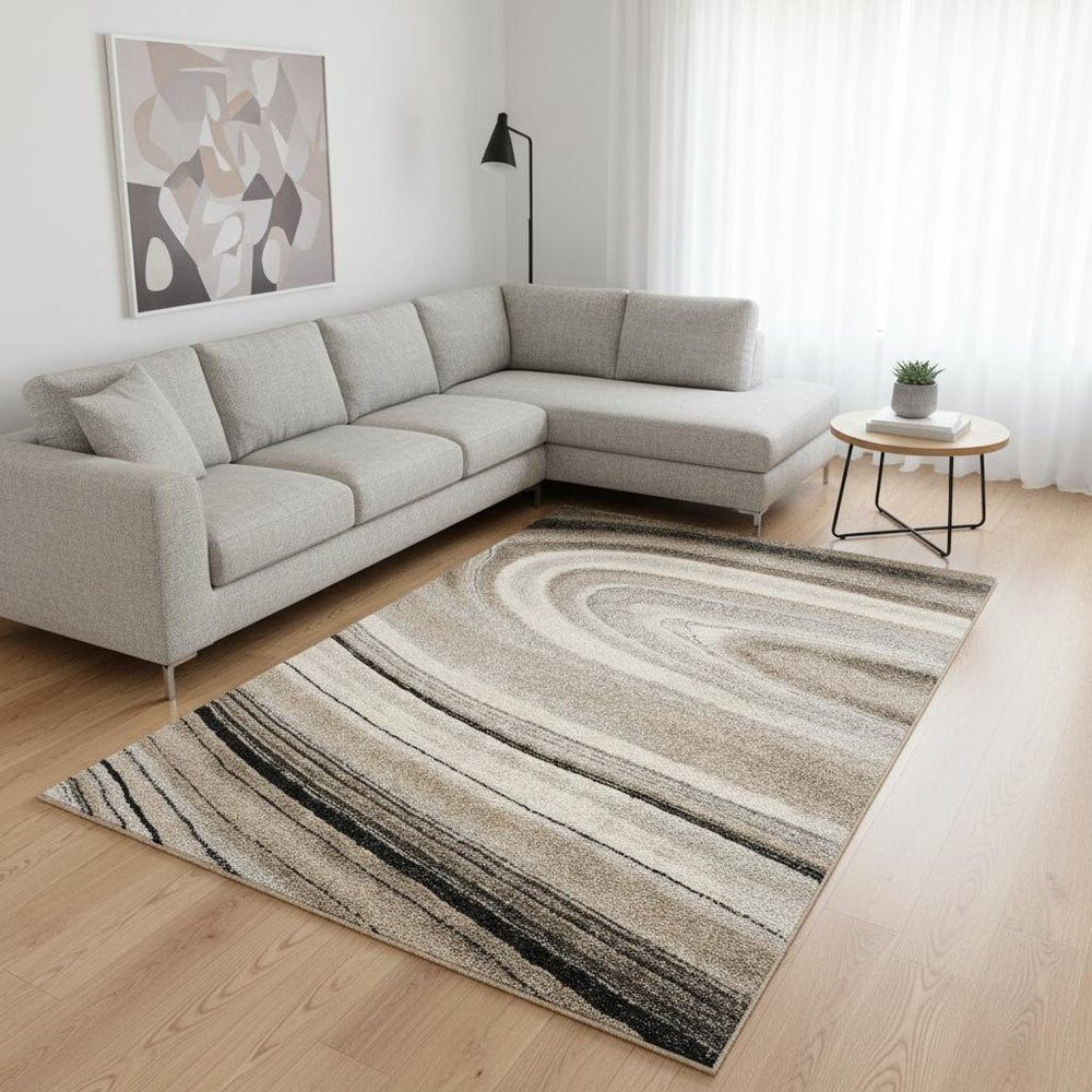 5' X 8' Cream and Tan Abstract Marble Area Rug