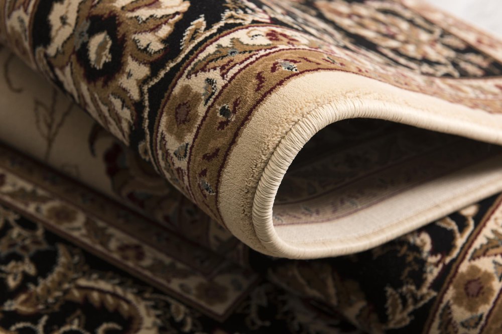 5' X 8' Black And Ivory Oriental Area Rug