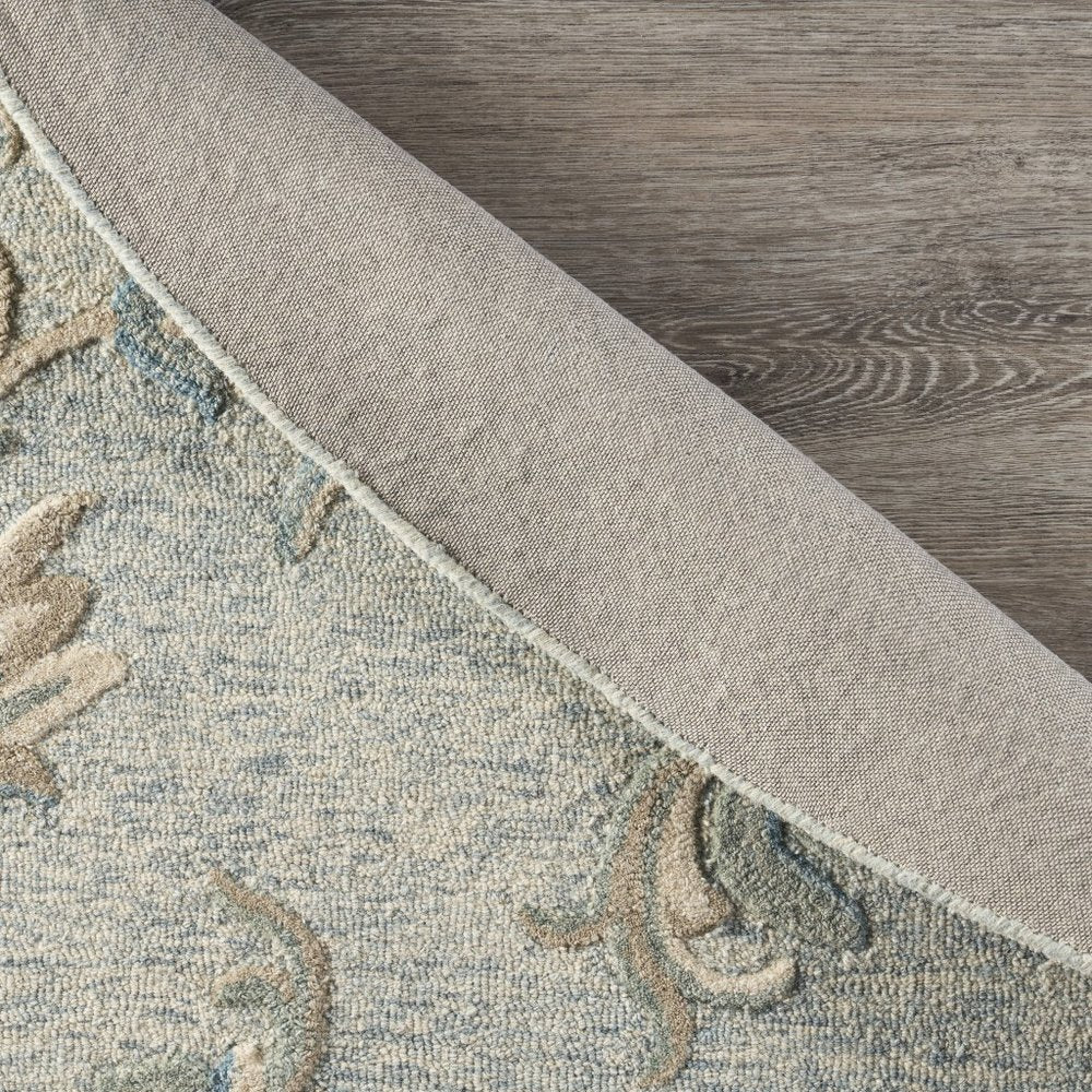 7' X 9' Blue And Ivory Wool Hand Tufted Area Rug