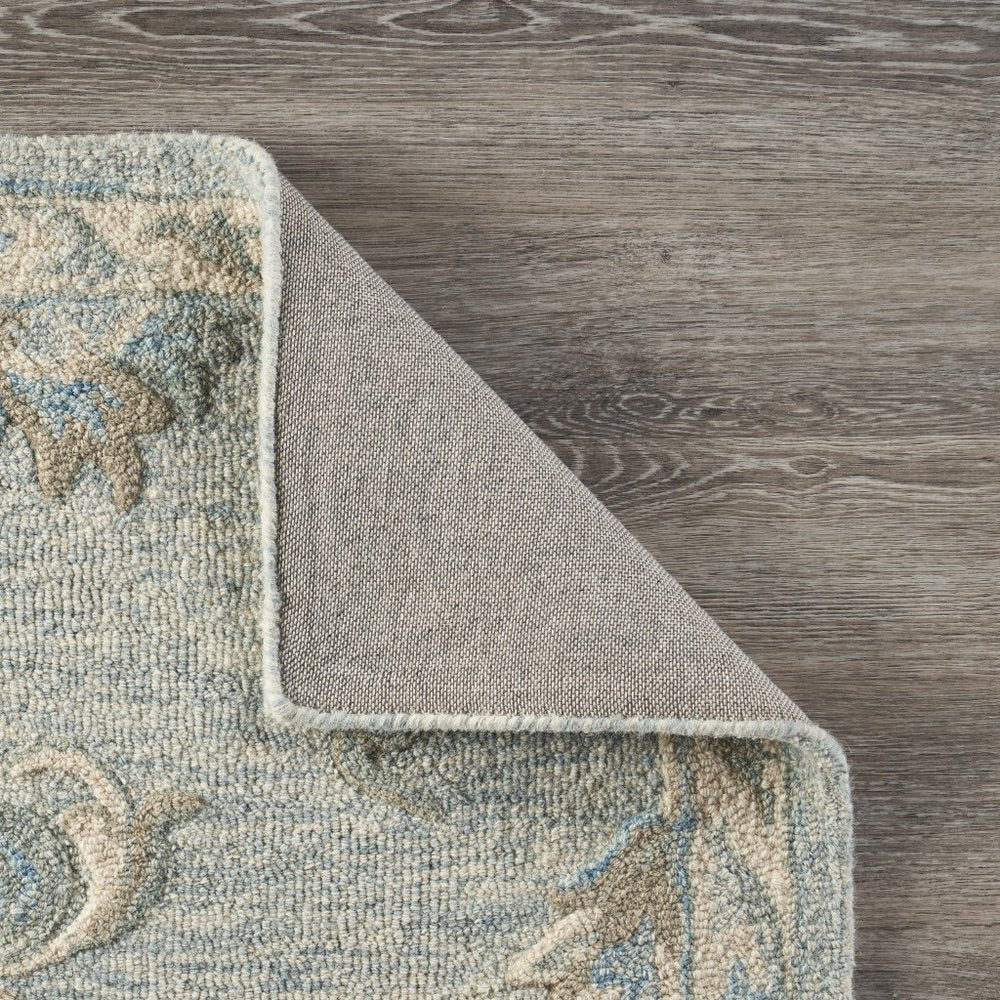 7' X 9' Blue And Ivory Wool Hand Tufted Area Rug