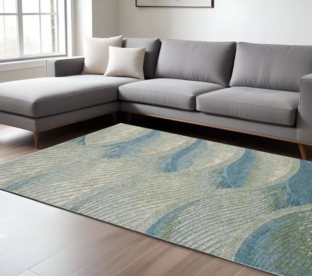 7' X 10' Beige Blue And Sage Abstract Area Rug