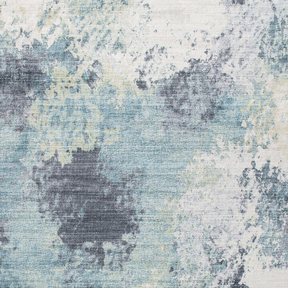 5' X 8' Blue and Ivory Abstract Area Rug