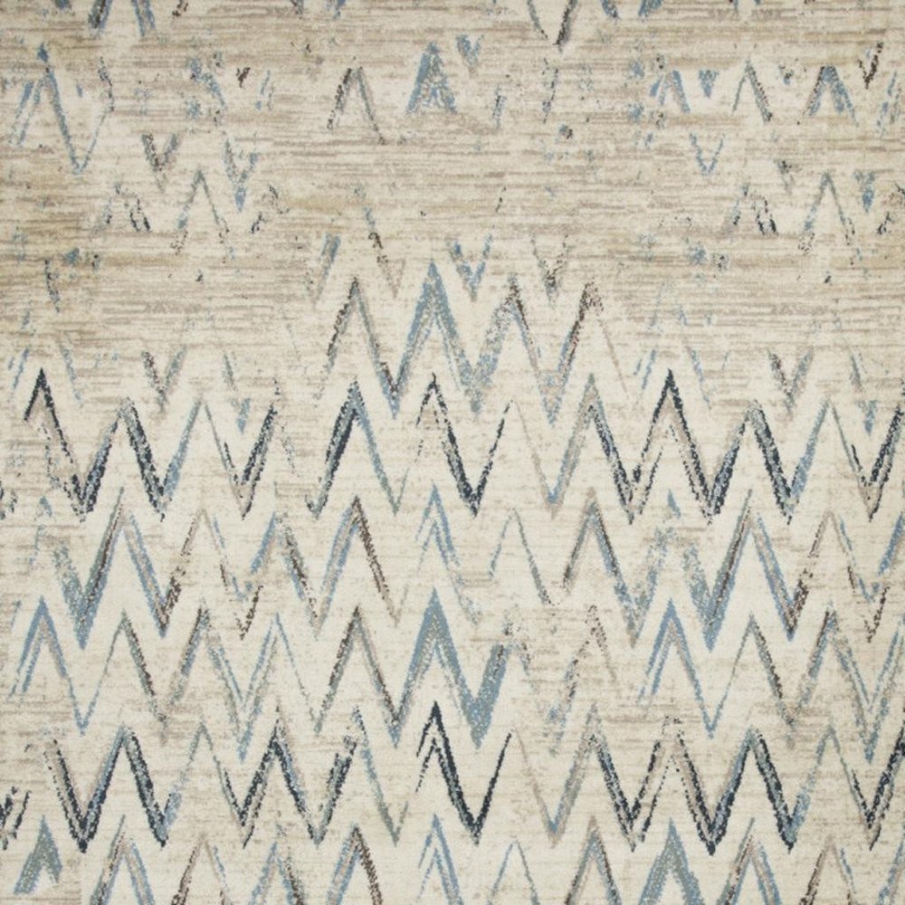 5' X 8' Ivory And Blue Chevron Area Rug
