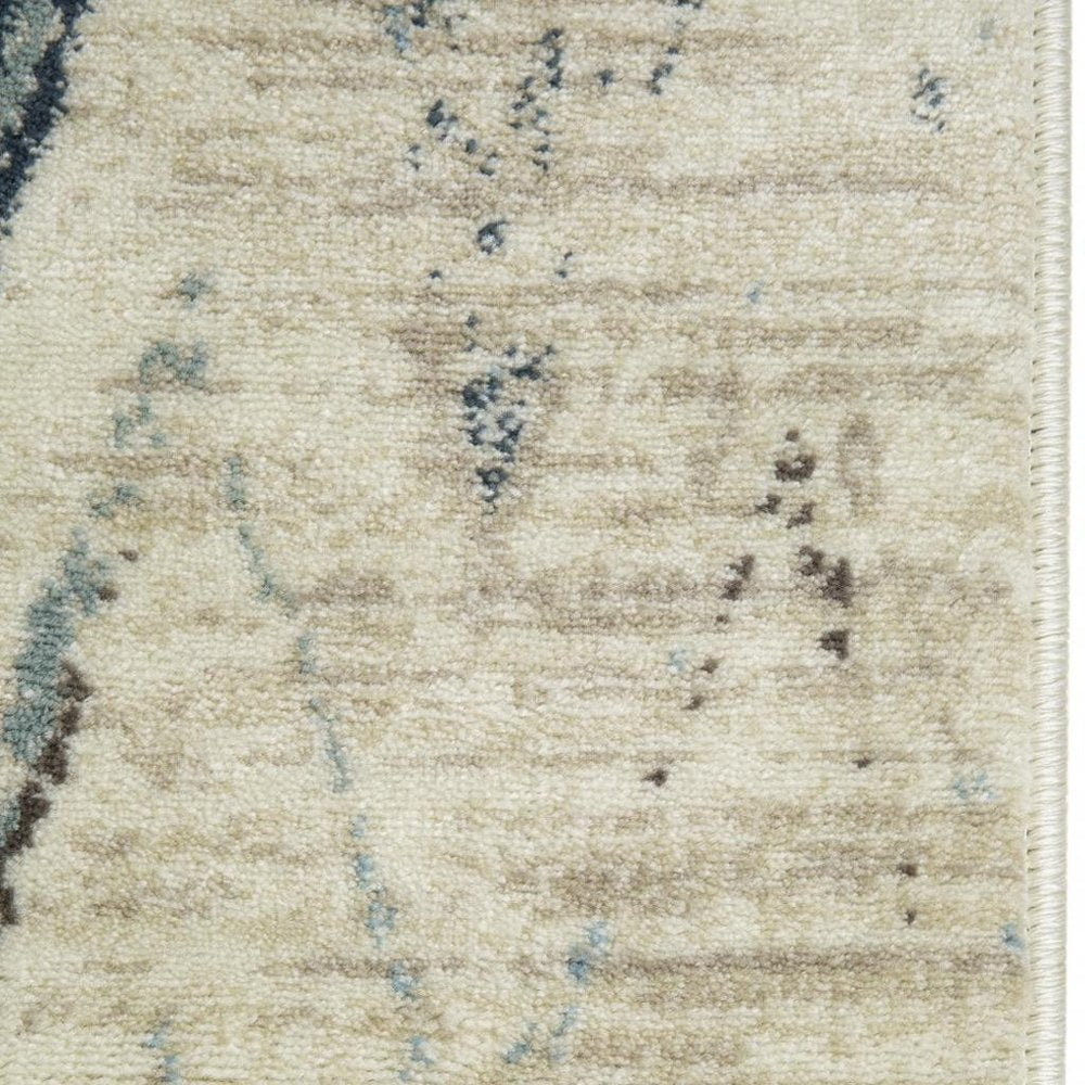 5' X 8' Ivory And Blue Chevron Area Rug