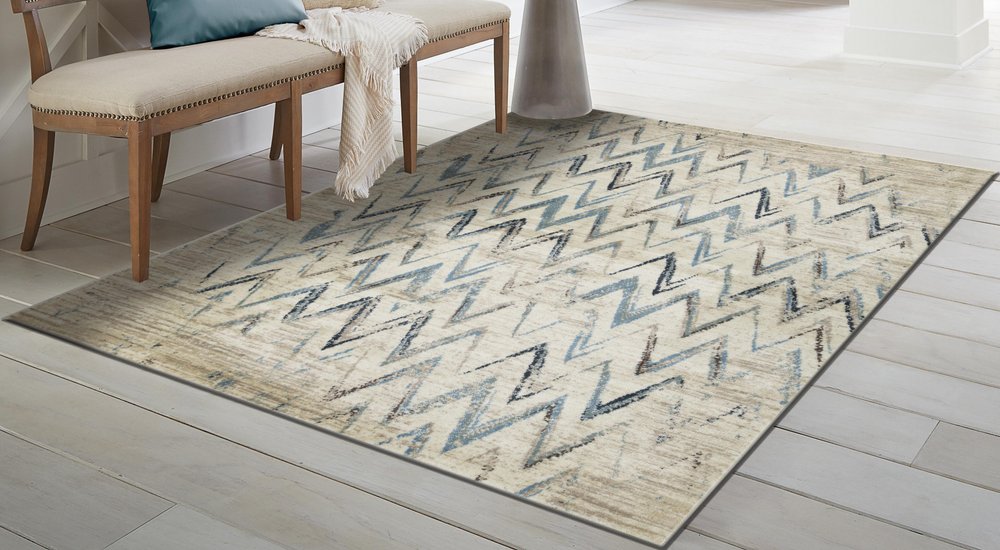 5' X 8' Ivory And Blue Chevron Area Rug