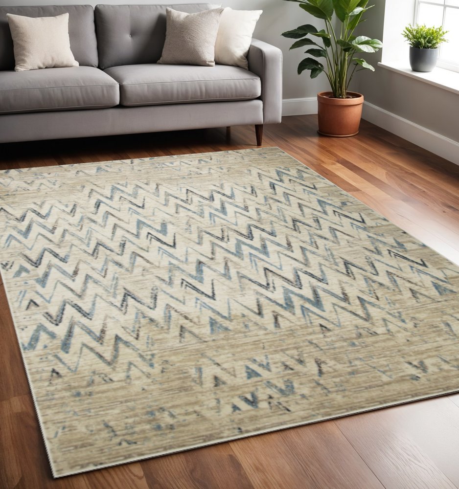 5' X 8' Ivory And Blue Chevron Area Rug