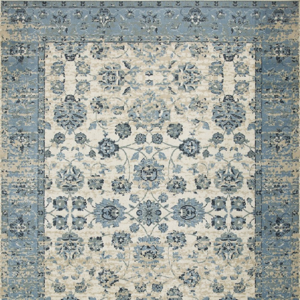 5' X 8' Ivory And Sky Blue Oriental Area Rug