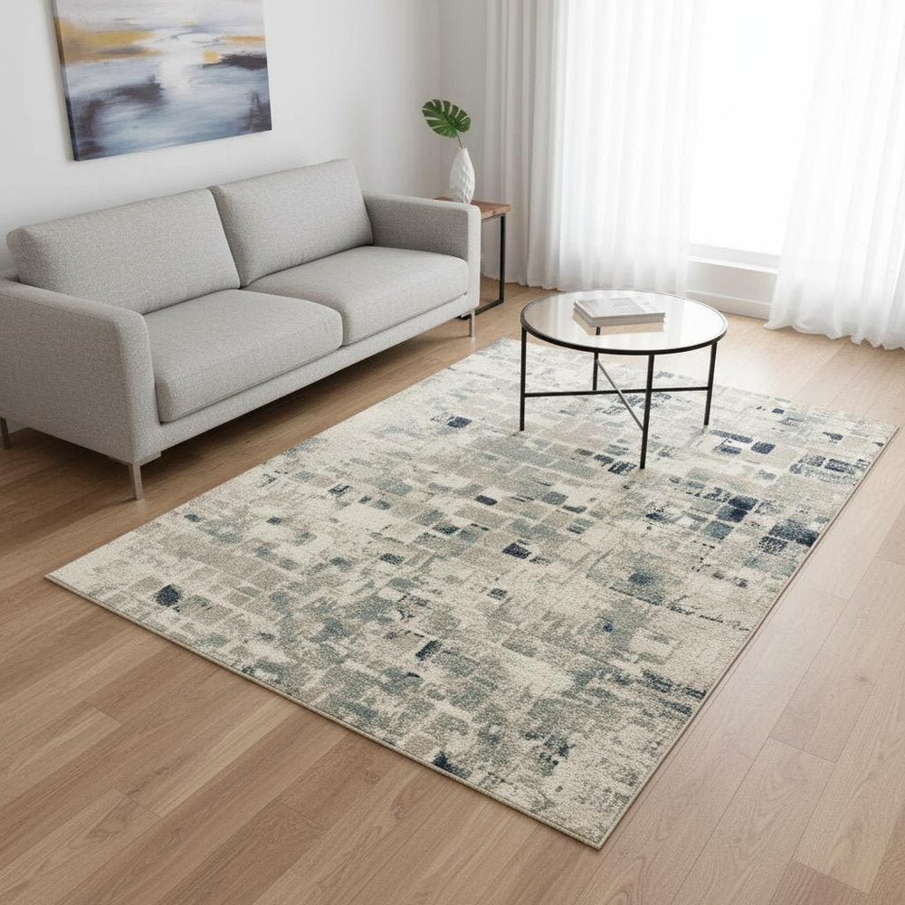 5' X 8' Blue and Beige Abstract Area Rug