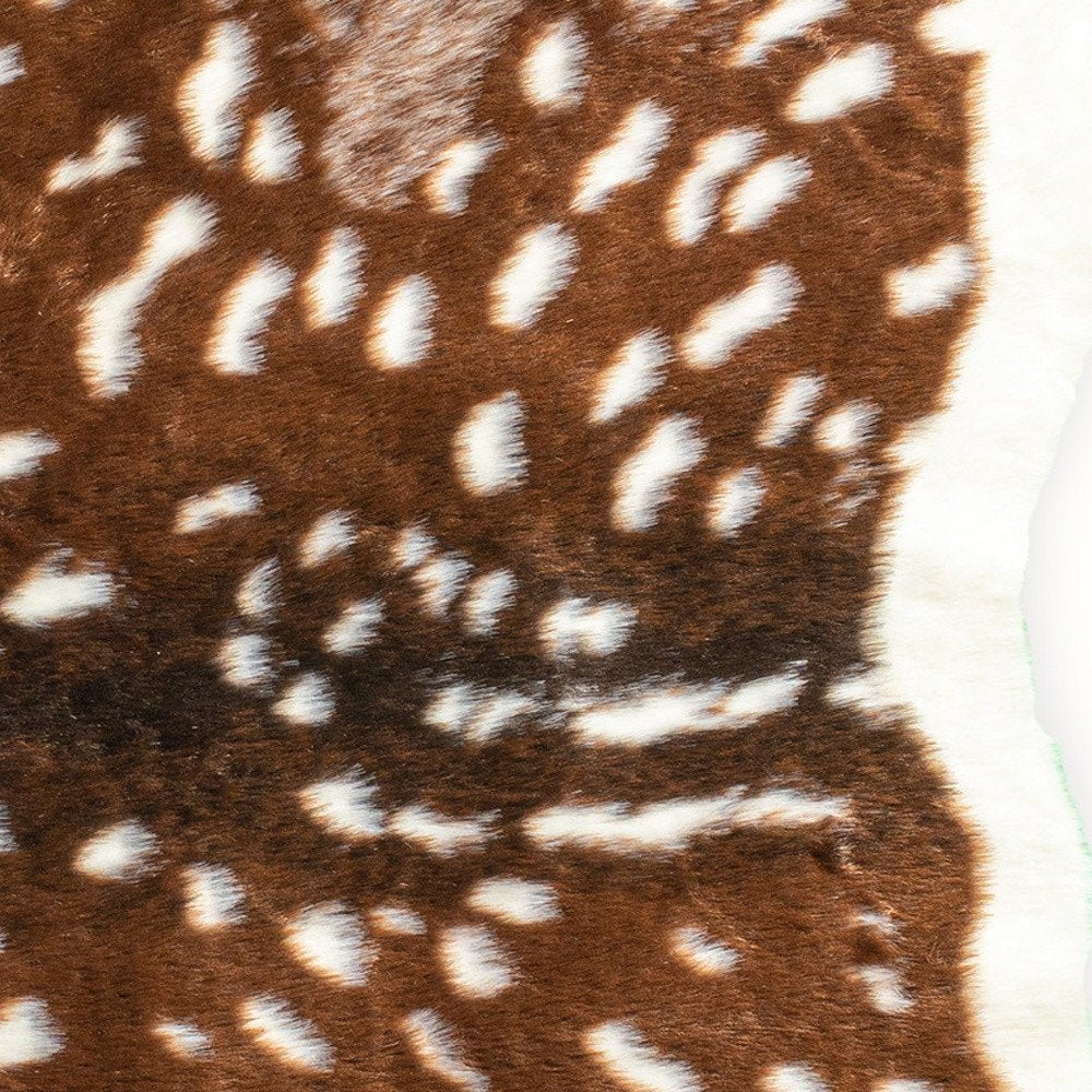 4' X 5' Brown And Off White Faux Cowhide Animal Print Washable Area Rug