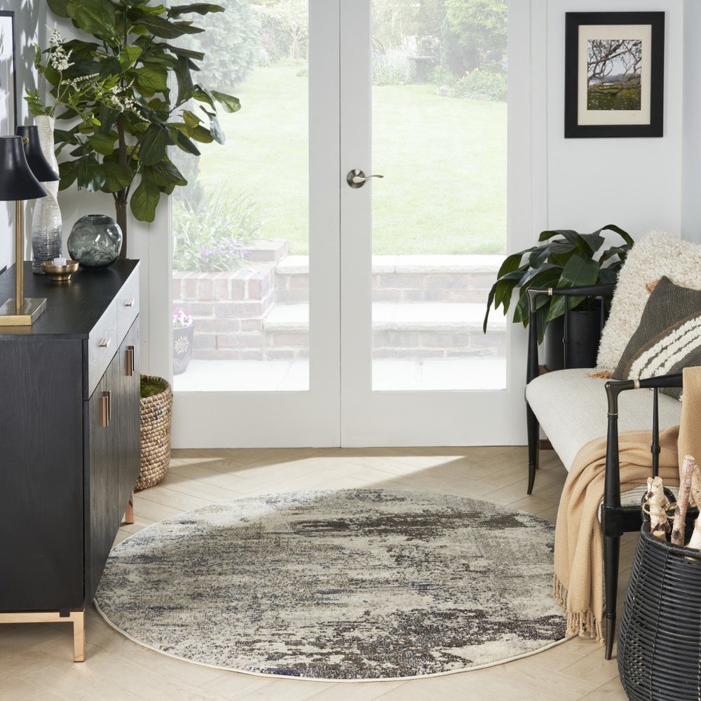 5' X 5' Ivory And Grey Round Abstract Power Loom Non Skid Area Rug