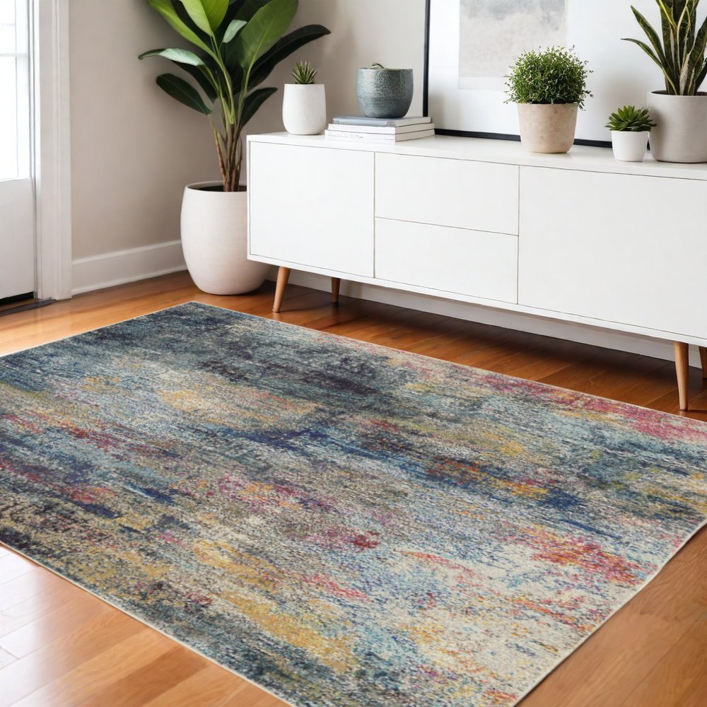 4' X 6' Blue And Ivory Abstract Distressed Area Rug