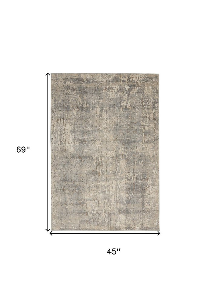 4' X 6' Beige And Grey Abstract Power Loom Non Skid Area Rug