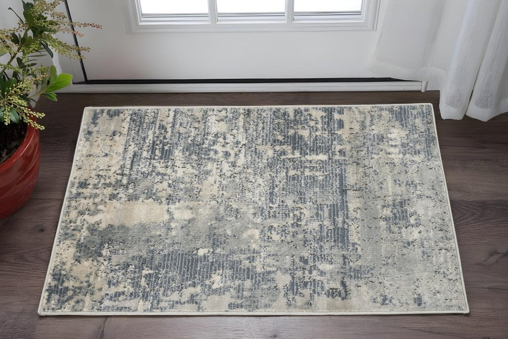 2' X 4' Beige And Gray Abstract Distressed Area Rug