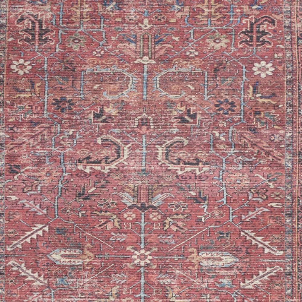 5' X 7' Pink And Blue Oriental Distressed Washable Area Rug
