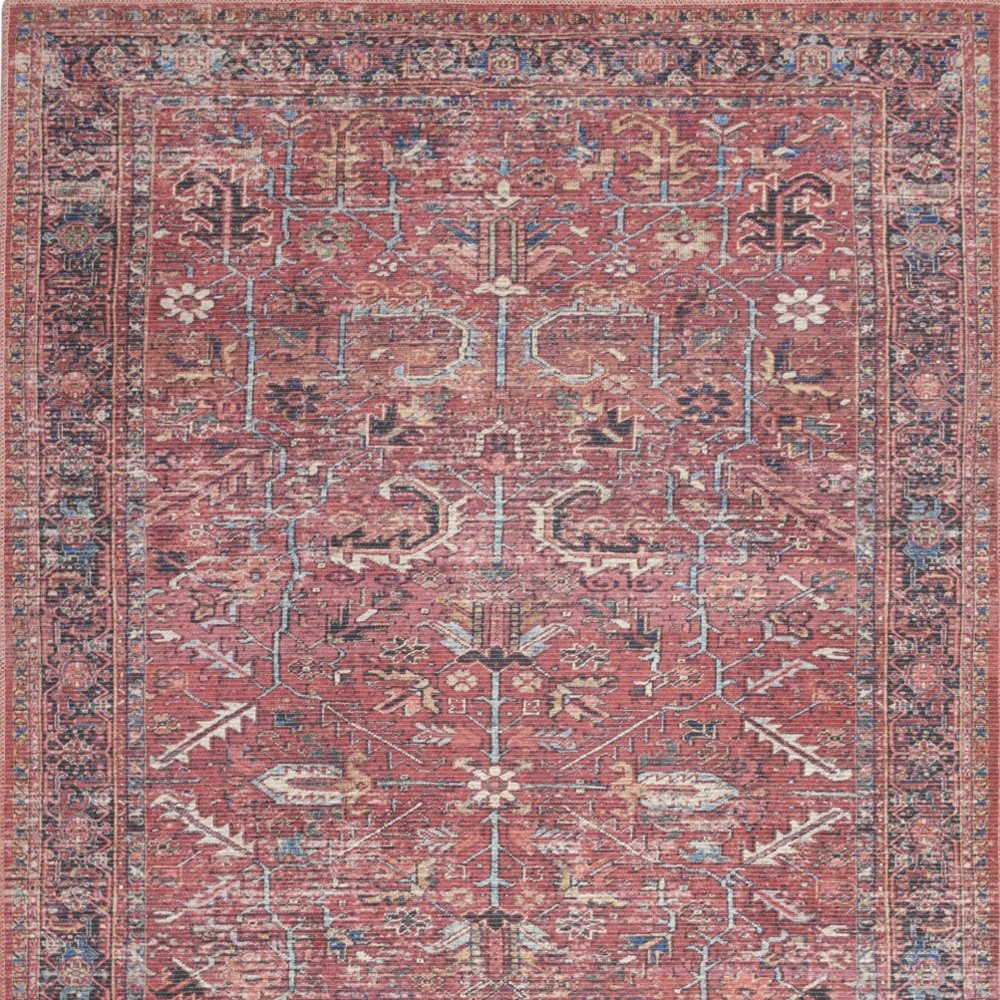 5' X 7' Pink And Blue Oriental Distressed Washable Area Rug