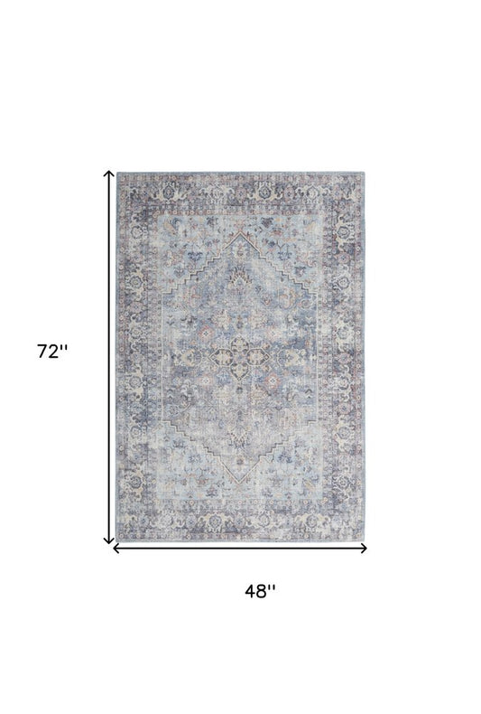 4' X 6' Light Grey And Blue Oriental Power Loom Distressed Washable Area Rug