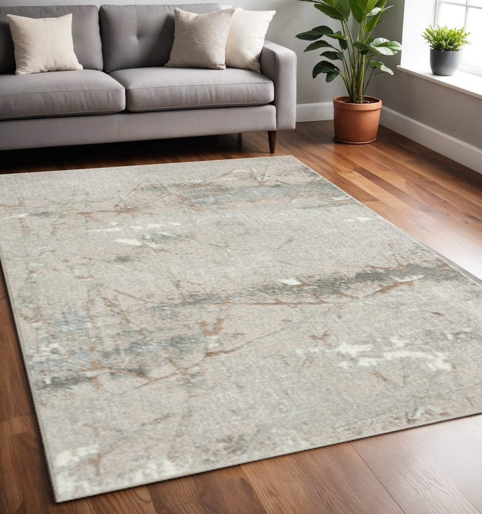 7' X 9' Beige Gray And Brown Abstract Area Rug