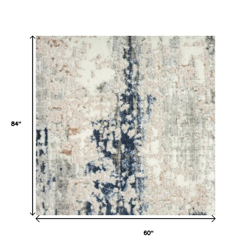 7' X 9' Beige Cream Blue And Gray Abstract Stain Resistant Area Rug