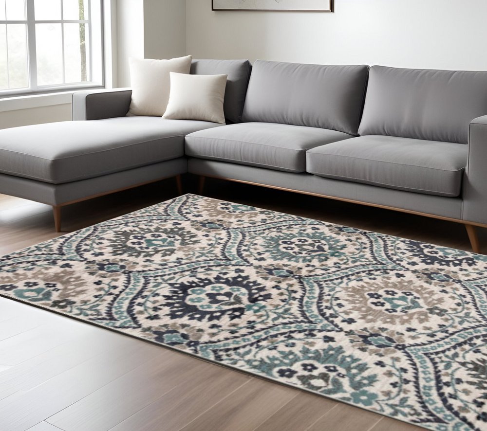 7' X 9' Ivory Blue And Gray Medallion Area Rug