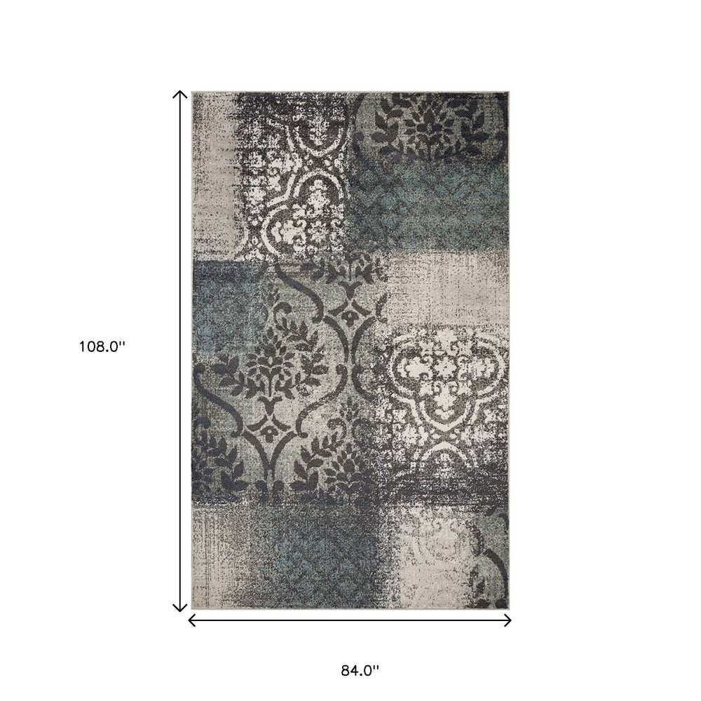 7' X 9' Teal And Ivory Damask Distressed Area Rug
