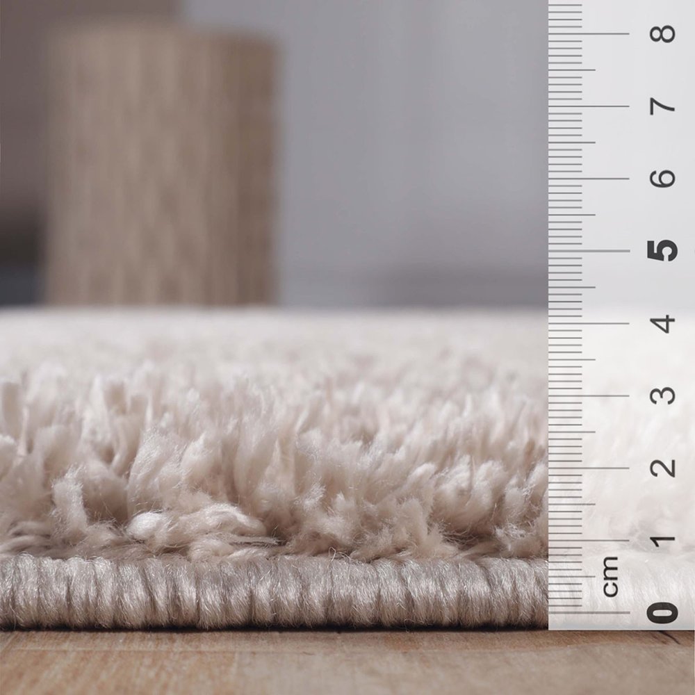 5' X 8' Beige Shag Handmade Area Rug