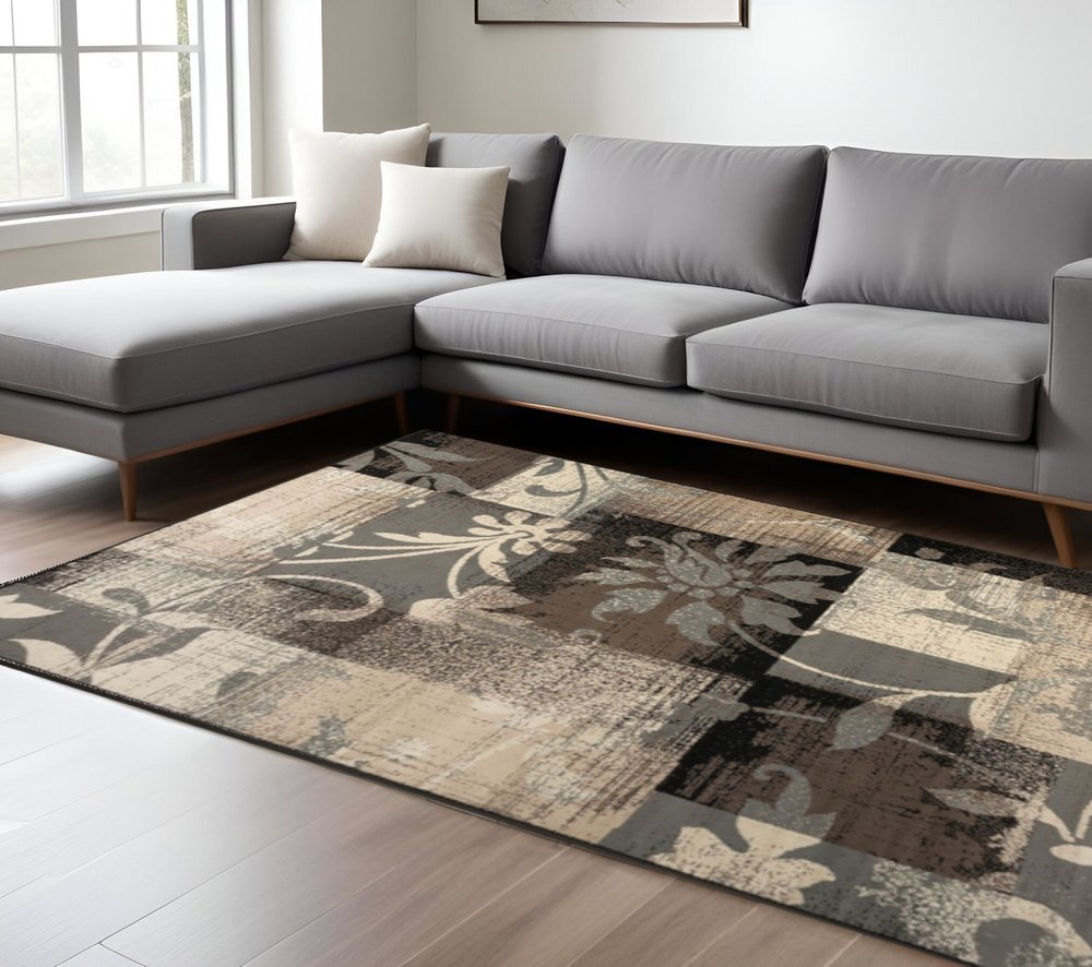 7' X 9' Beige Brown And Gray Floral Distressed Area Rug