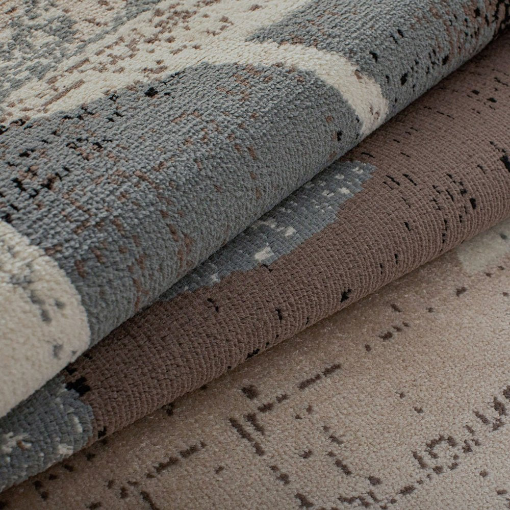 7' X 9' Beige Brown And Gray Floral Distressed Area Rug