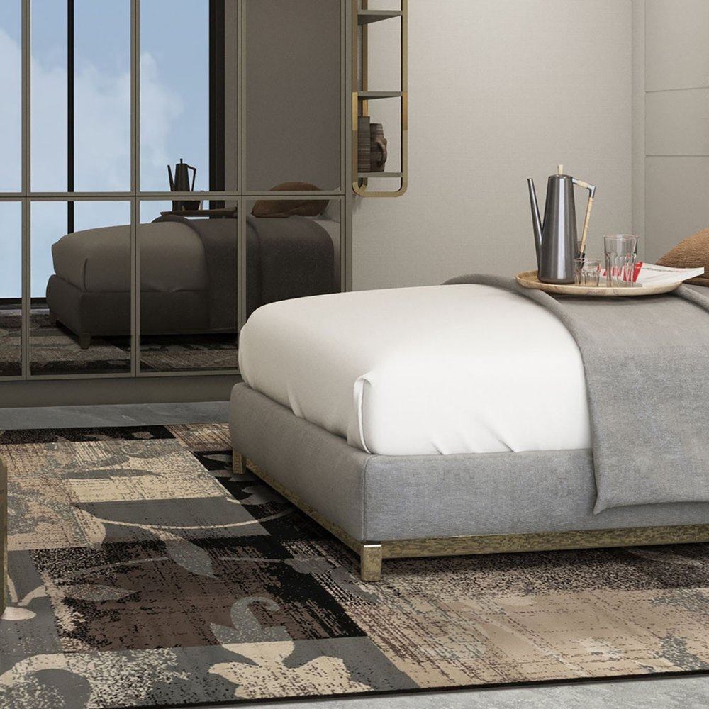 7' X 9' Beige Brown And Gray Floral Distressed Area Rug