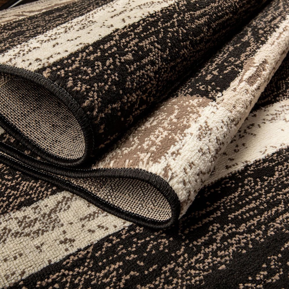 4' X 6' Black Brown And Beige Patchwork Area Rug