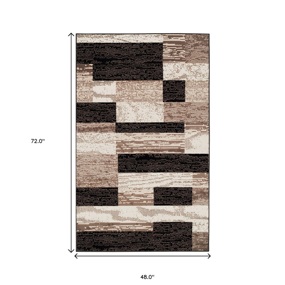 4' X 6' Black Brown And Beige Patchwork Area Rug