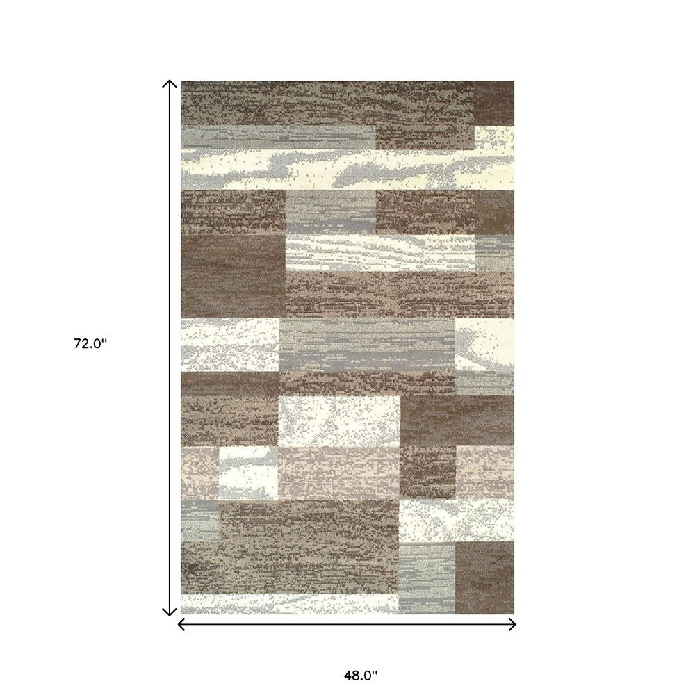 4' X 6' Blue And Ivory Patchwork Area Rug