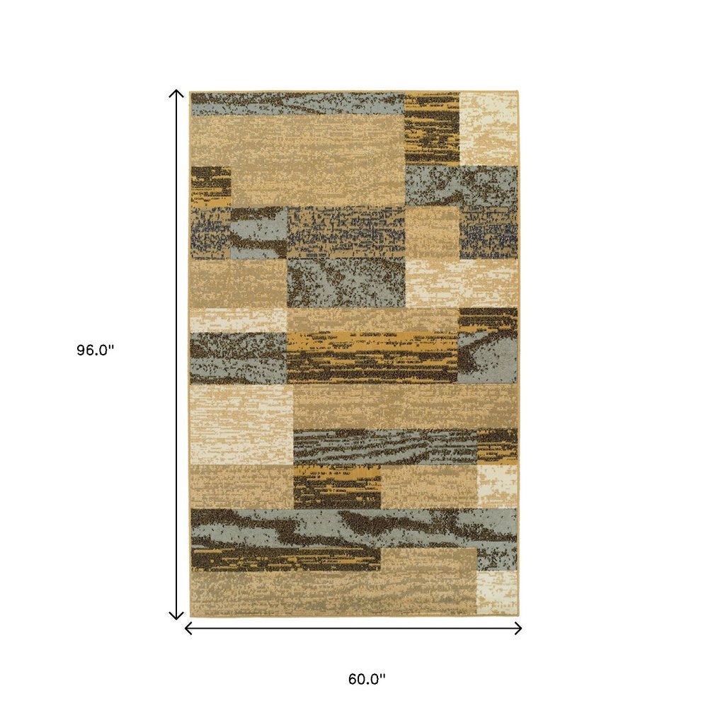 5' X 8' Blue And Beige Patchwork Area Rug