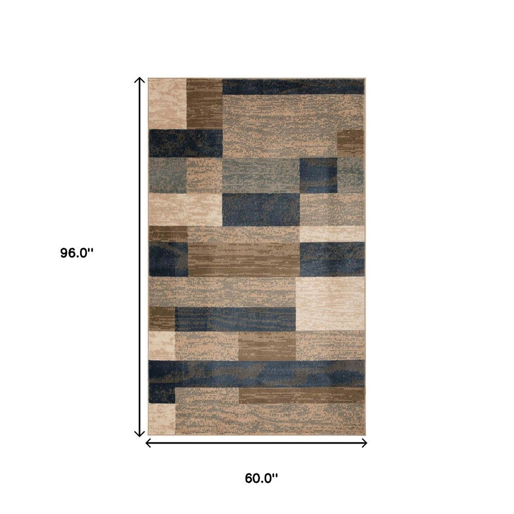 5' X 8' Blue Brown And Beige Patchwork Area Rug