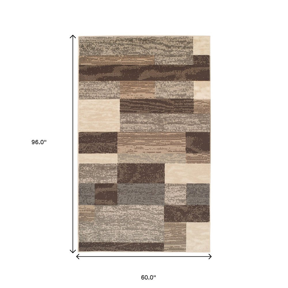 5' X 8' Beige Slate Gray And Brown Patchwork Area Rug