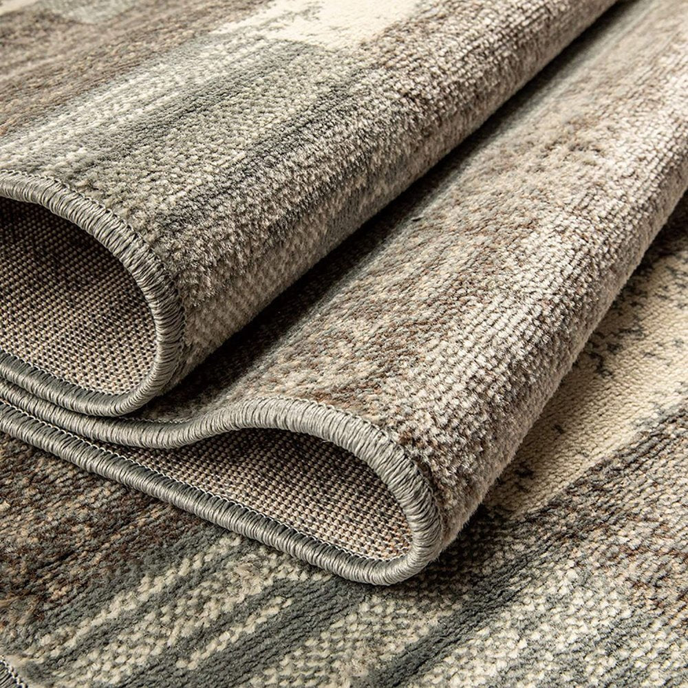 7' X 9' Blue And Ivory Patchwork Area Rug