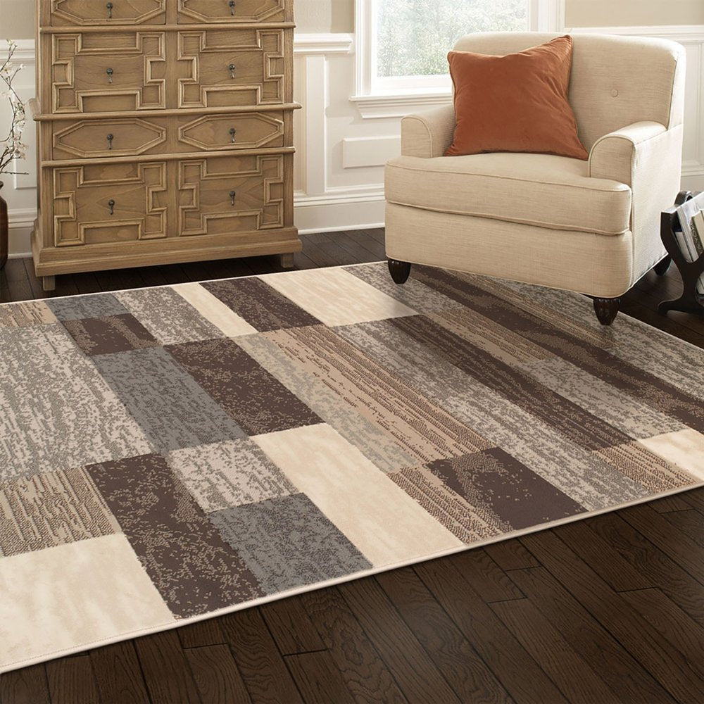 7' X 9' Beige Slate Gray And Brown Patchwork Area Rug