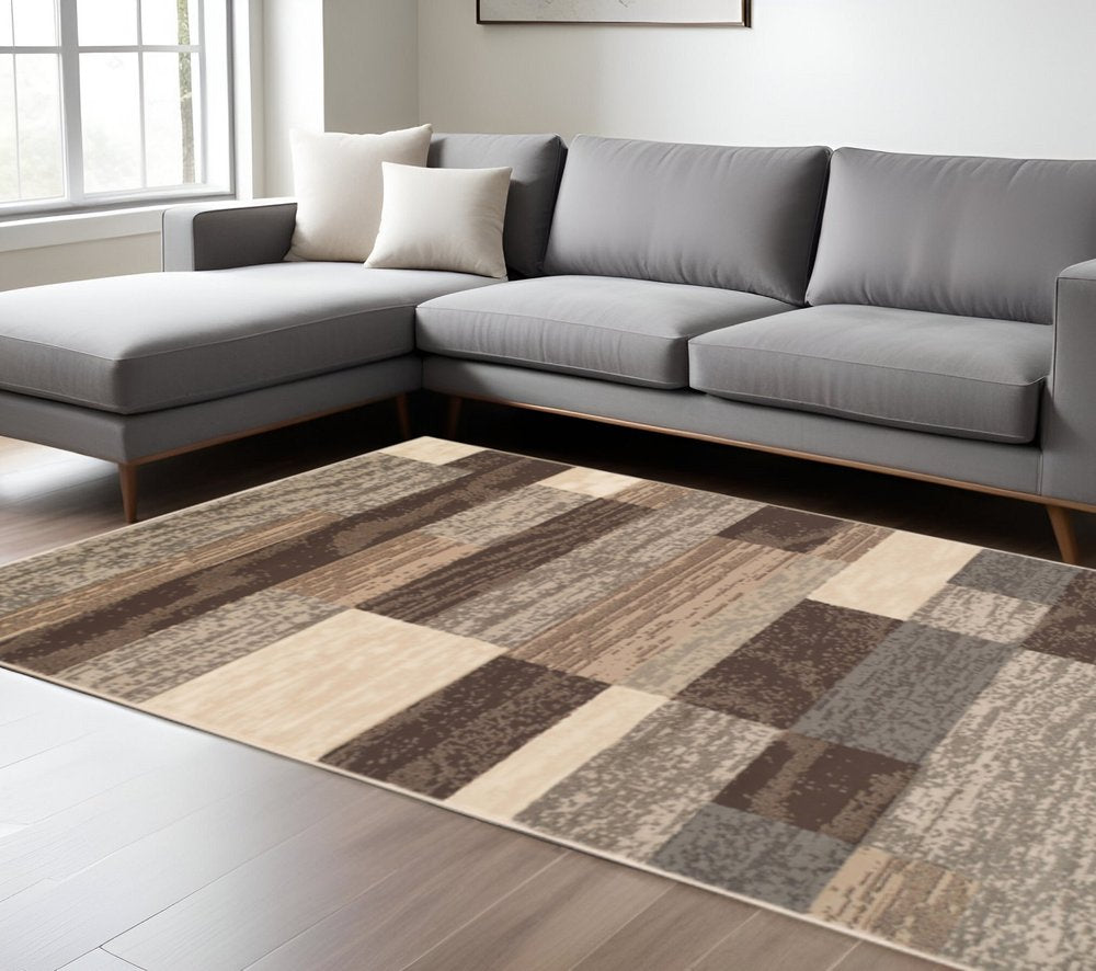 7' X 9' Beige Slate Gray And Brown Patchwork Area Rug