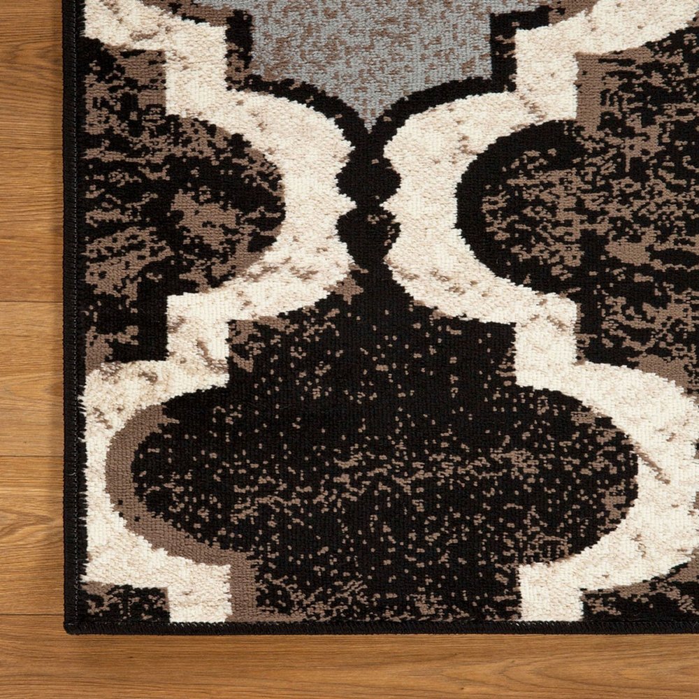 11' Brown Black And Ivory Quatrefoil Distressed Runner Rug