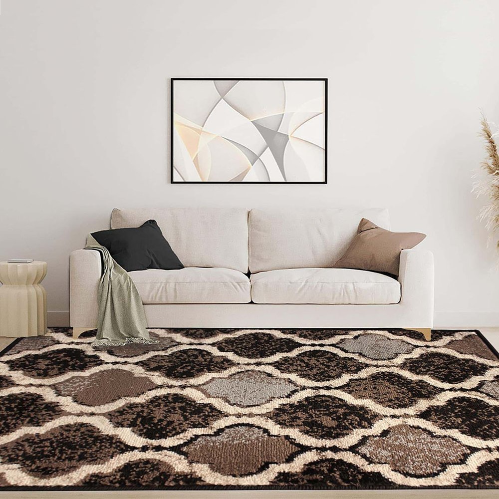 6' X 9' Brown Black And Ivory Quatrefoil Distressed Area Rug