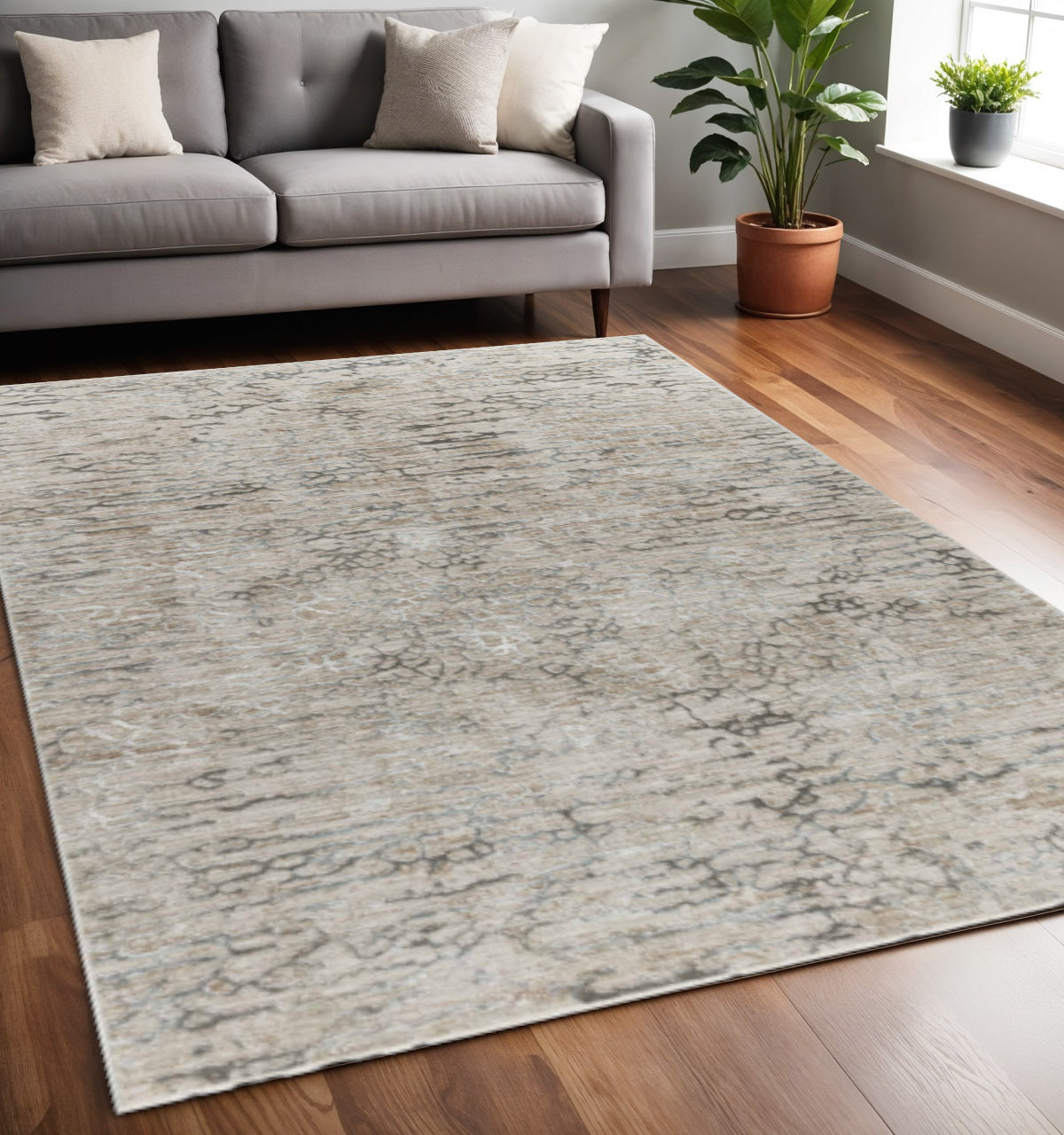 5' X 8' Beige Abstract Stain Resistant Area Rug