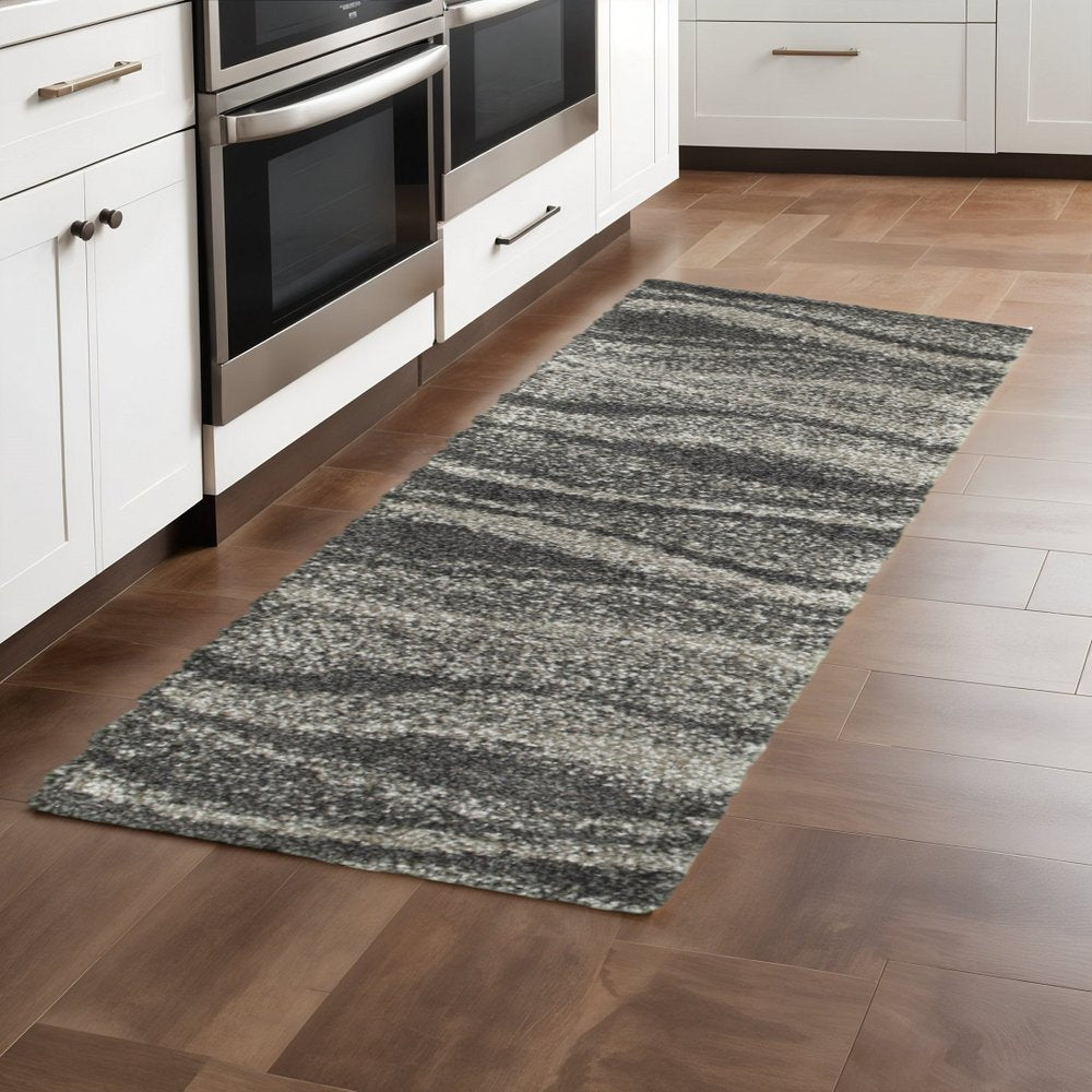 6' X 9' Charcoal Silver And Grey Abstract Shag Power Loom Stain Resistant Area Rug