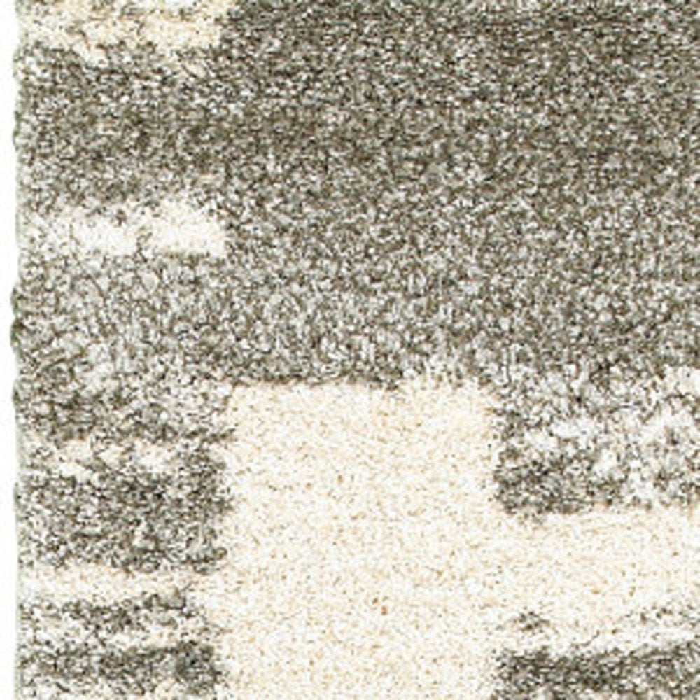 8' X 11' Grey Ivory And Silver Geometric Shag Power Loom Stain Resistant Area Rug